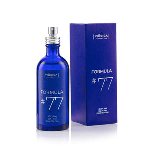 Apă de Parfum Formula #77, sticlă și cutie albastră.