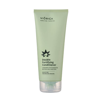 Balsam dublu fortifiant Viorica în tub verde deschis cu keratină vegetală și biotină.