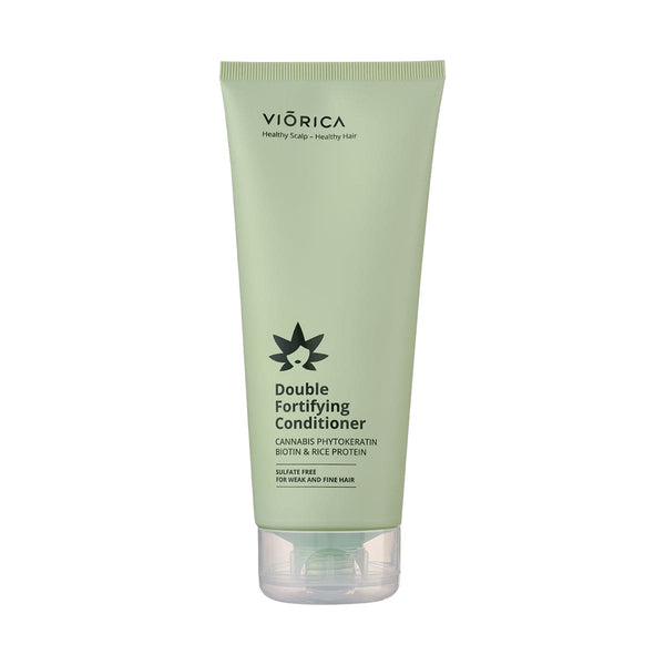 Balsam dublu fortifiant Viorica în tub verde deschis cu keratină vegetală și biotină.