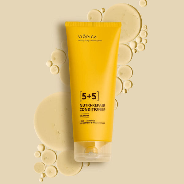 Balsam Nutri-Reparator Viorica, tub galben, pentru păr uscat, detaliu textură uleioasă.