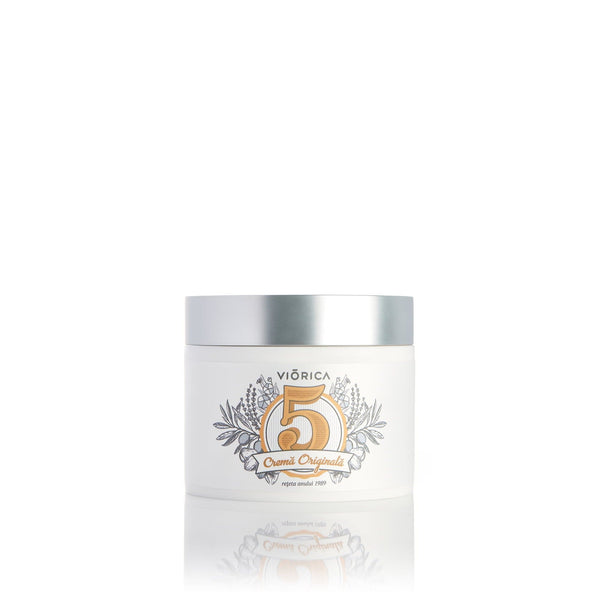 Cremă de corp Viorica cu 5 uleiuri, capac argintiu, recipient alb elegant.