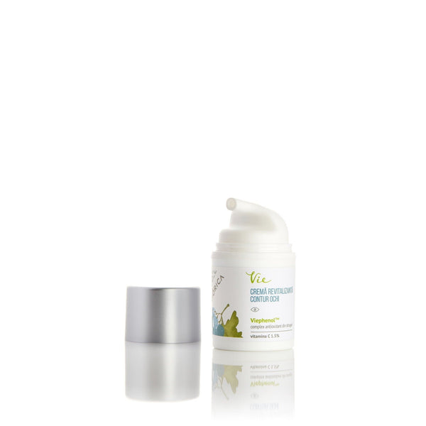 Cremă revitalizantă contur ochi cu complex antioxidant din struguri, ambalaj alb cu capac argintiu, textură fină.