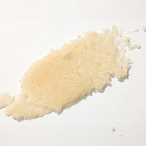 Textură granulară exfoliantă de zahăr, culoare crem deschis, detaliu produs Viorica Essentielle.