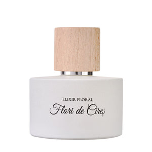 Sticlă albă elegantă parfum „Elixir Floral Flori de Cireș” cu capac din lemn natural.