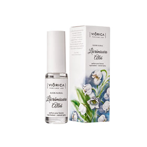 Parfum „Elixir Floral Lăcrămioara Albă”, flacon alb cu cutie decorată floral.