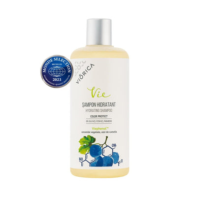 Șampon hidratant Viorica Vie, sticlă albă, capac argintiu, etichetă cu struguri.