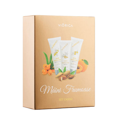 Set cadou “Mâini Frumoase” Viorica cu creme alb colorate; cutie maro elegantă.